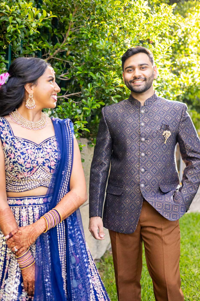 Bride and groom in blue sangeet outfits at Glenwood, Sydney