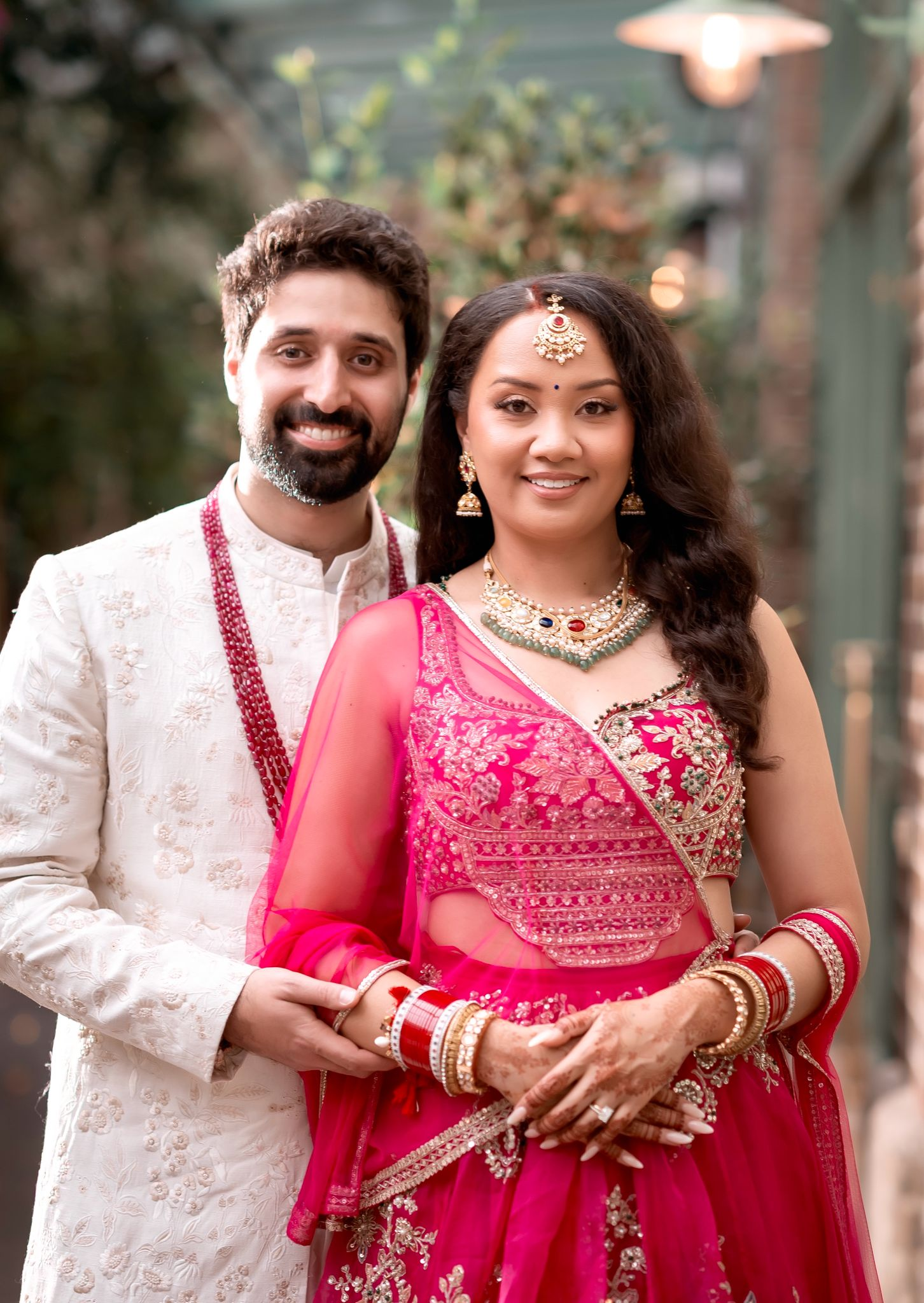 Shania and Anshul in pink and cream for their Punjabi Hindu wedding ceremony in Sydney