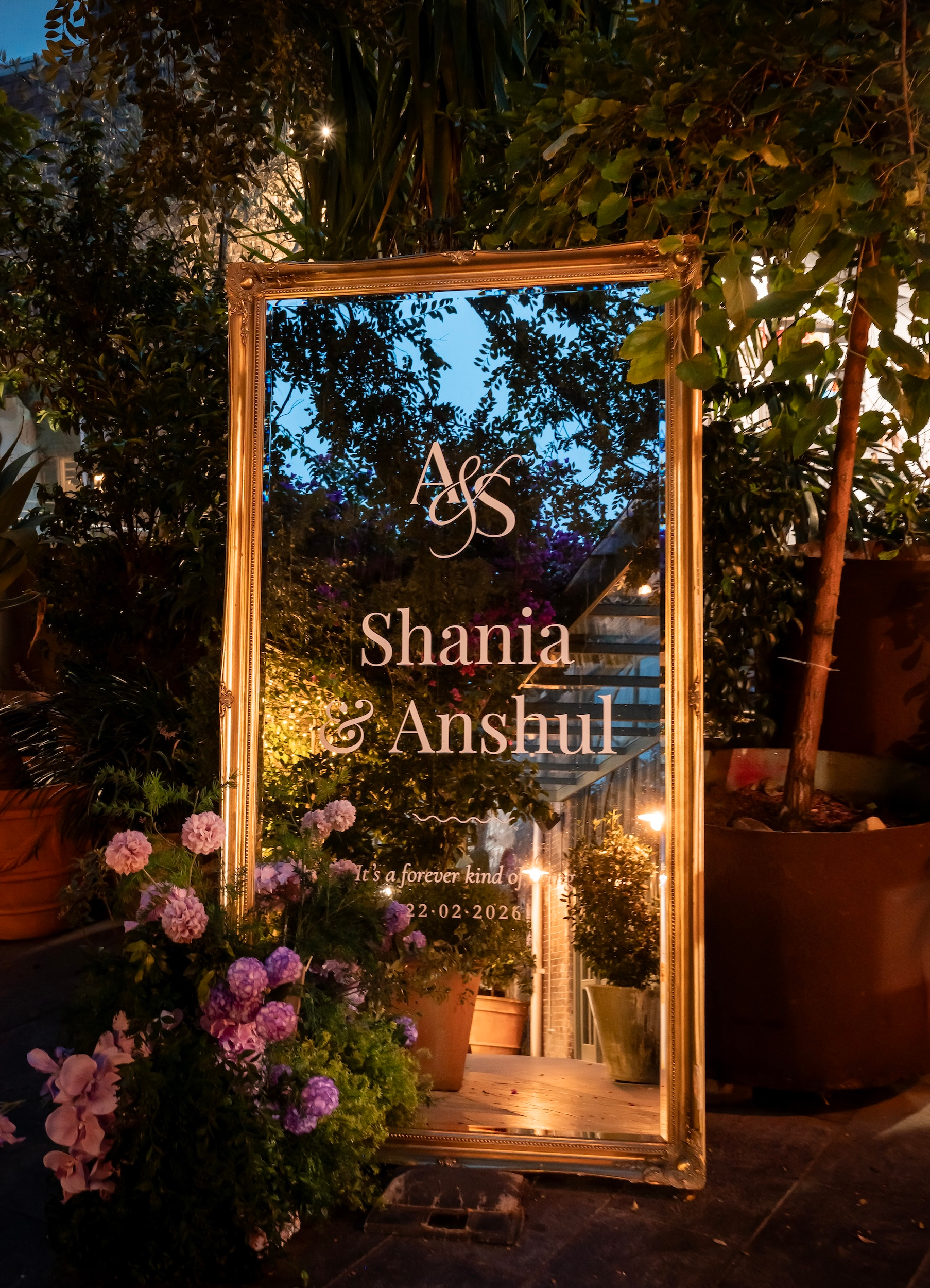 Gold mirror welcome sign for Shania and Anshul's wedding reception at The Grounds of Alexandria